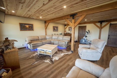 post-and-beam-home-basement-living-room