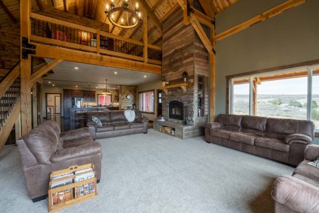 post-and-beam-living-room-with-overhead-loft