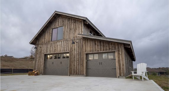 Post-and-beam-barn-exterior-with-garage-doors